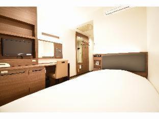 Hotel New Amami Habitación foto