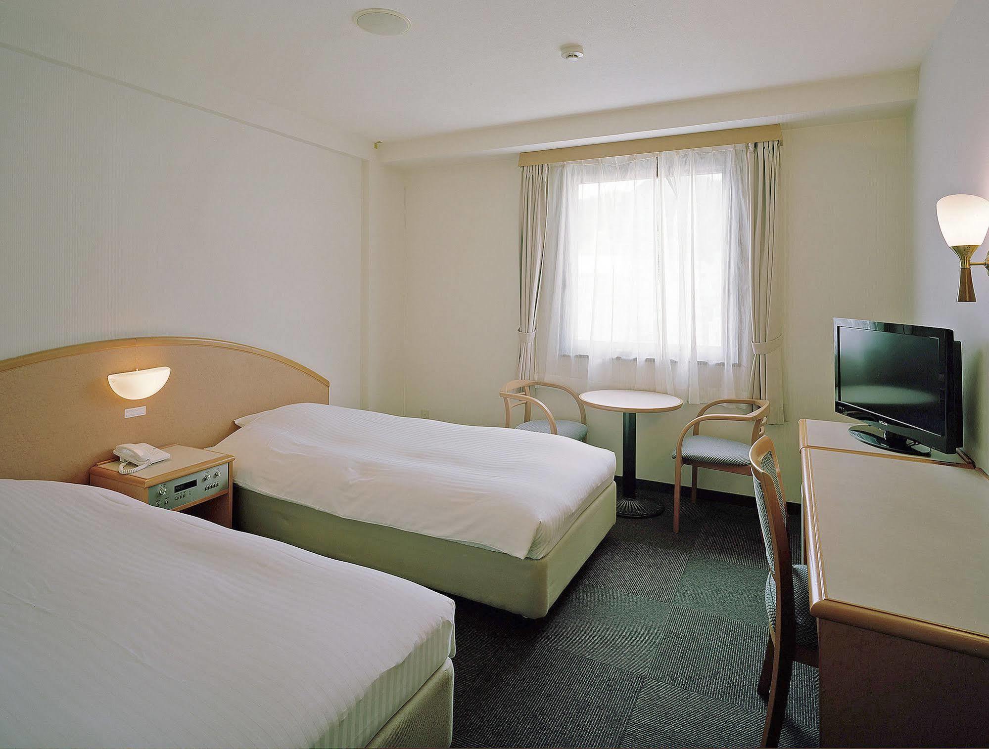Hotel New Amami Exterior foto